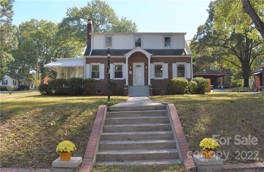 1301 Jackson Road Gastonia, NC 28052 - Photo 4 of 44 a front view of a house with a yard