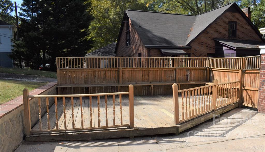1301 Jackson Road Gastonia, NC 28052 - Photo 10 of 44 a view of balcony with deck and trees