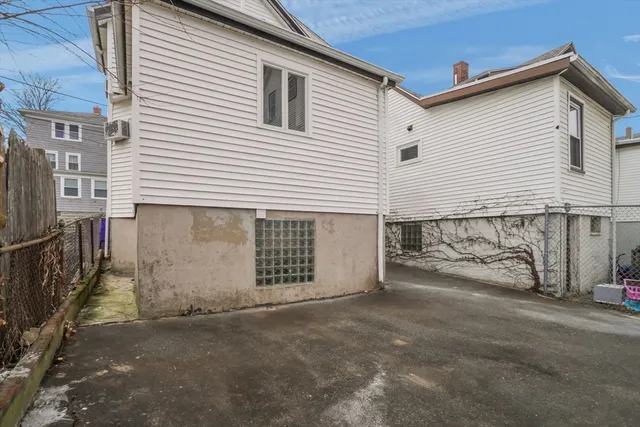 a view of a house with a street
