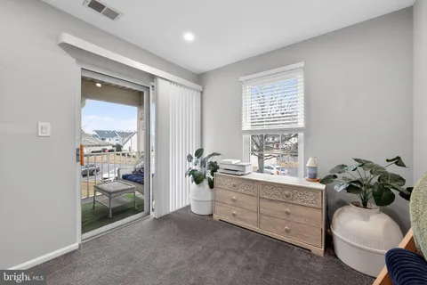 a room with furniture and a window