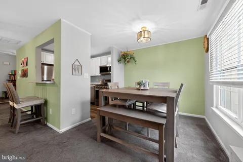 a view of a workspace with furniture