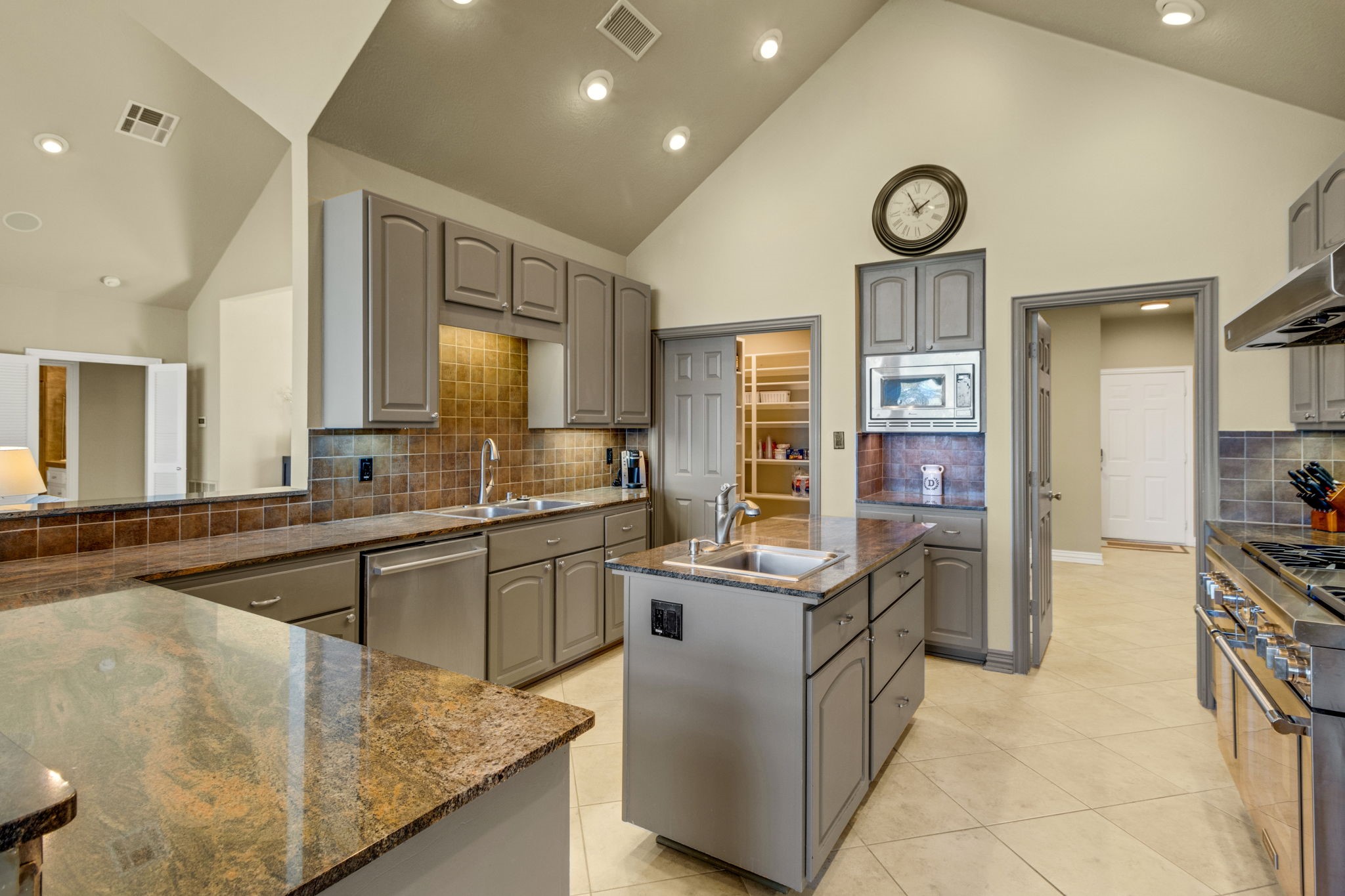 290 Harbor Run Drive Coldspring, TX 77331 - Photo 12 of 42 The chef’s kitchen offers abundant storage and generous prep space
