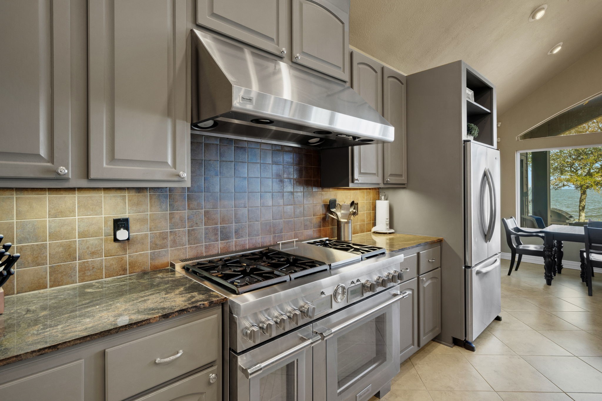 290 Harbor Run Drive Coldspring, TX 77331 - Photo 13 of 42 The Thermador gas range with dual ovens adds both performance and style to the kitchen