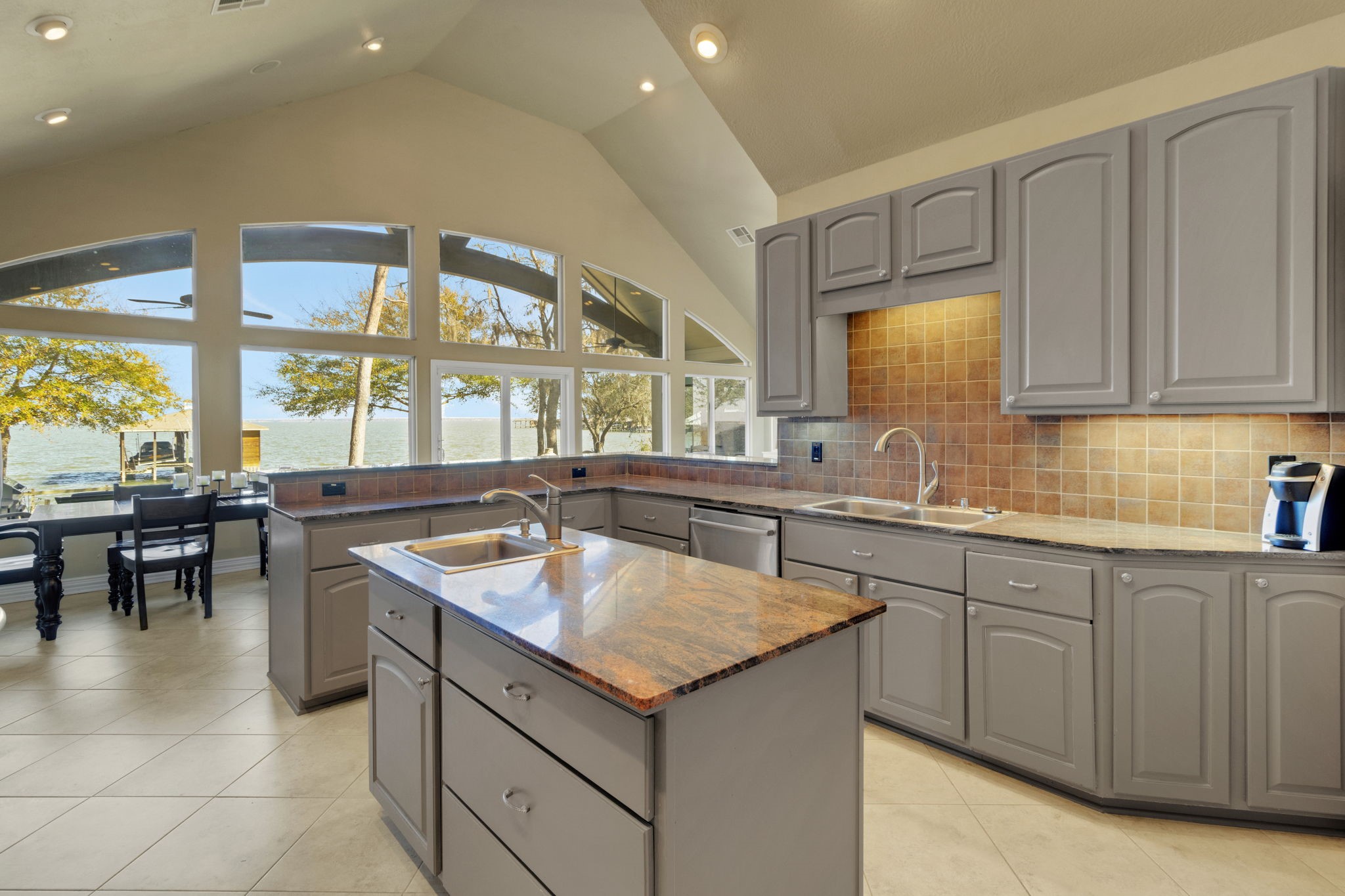 290 Harbor Run Drive Coldspring, TX 77331 - Photo 14 of 42 The kitchen island with second sink adds convenience and extra prep space