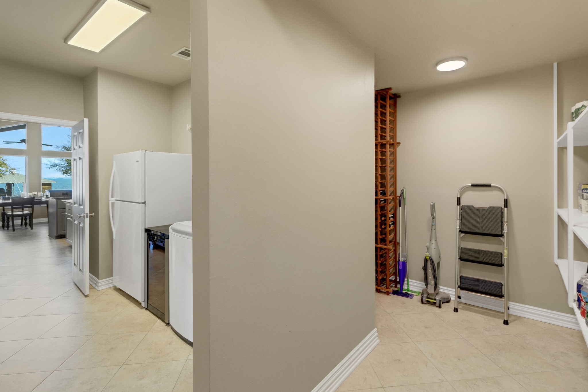 290 Harbor Run Drive Coldspring, TX 77331 - Photo 16 of 42 Between the kitchen and the garage is the laundry room and mud room - the home has lots of storage space throughout