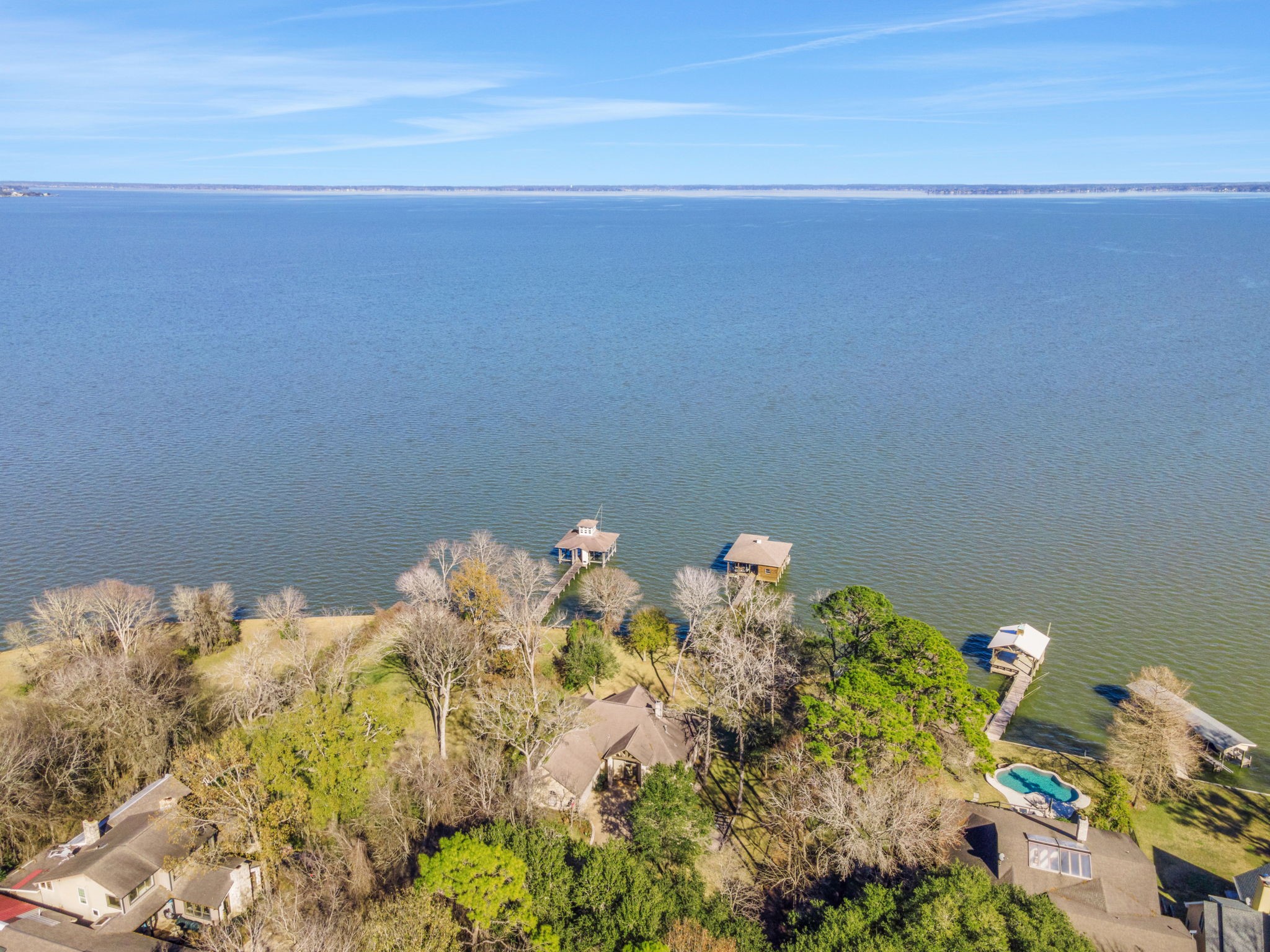 290 Harbor Run Drive Coldspring, TX 77331 - Photo 38 of 42 Located on open water, the home enjoys expansive, unobstructed lake views