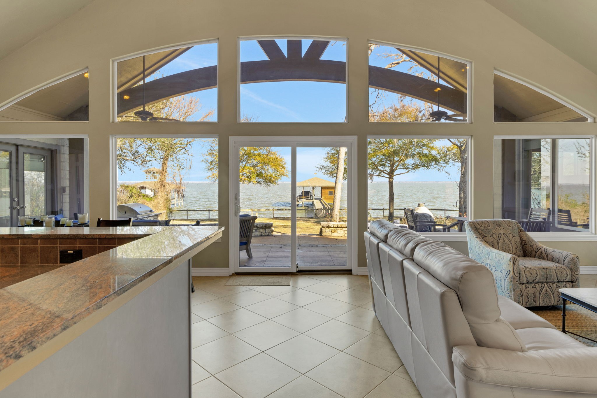 290 Harbor Run Drive Coldspring, TX 77331 - Photo 6 of 42 The wall of windows frame the open water views of Lake Livingston