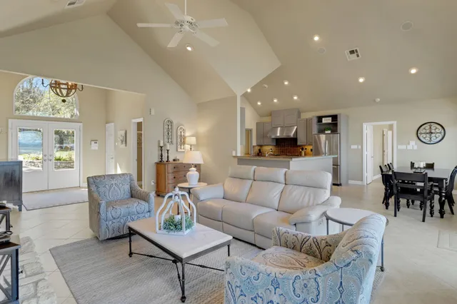 a kitchen with a sink appliances and cabinets