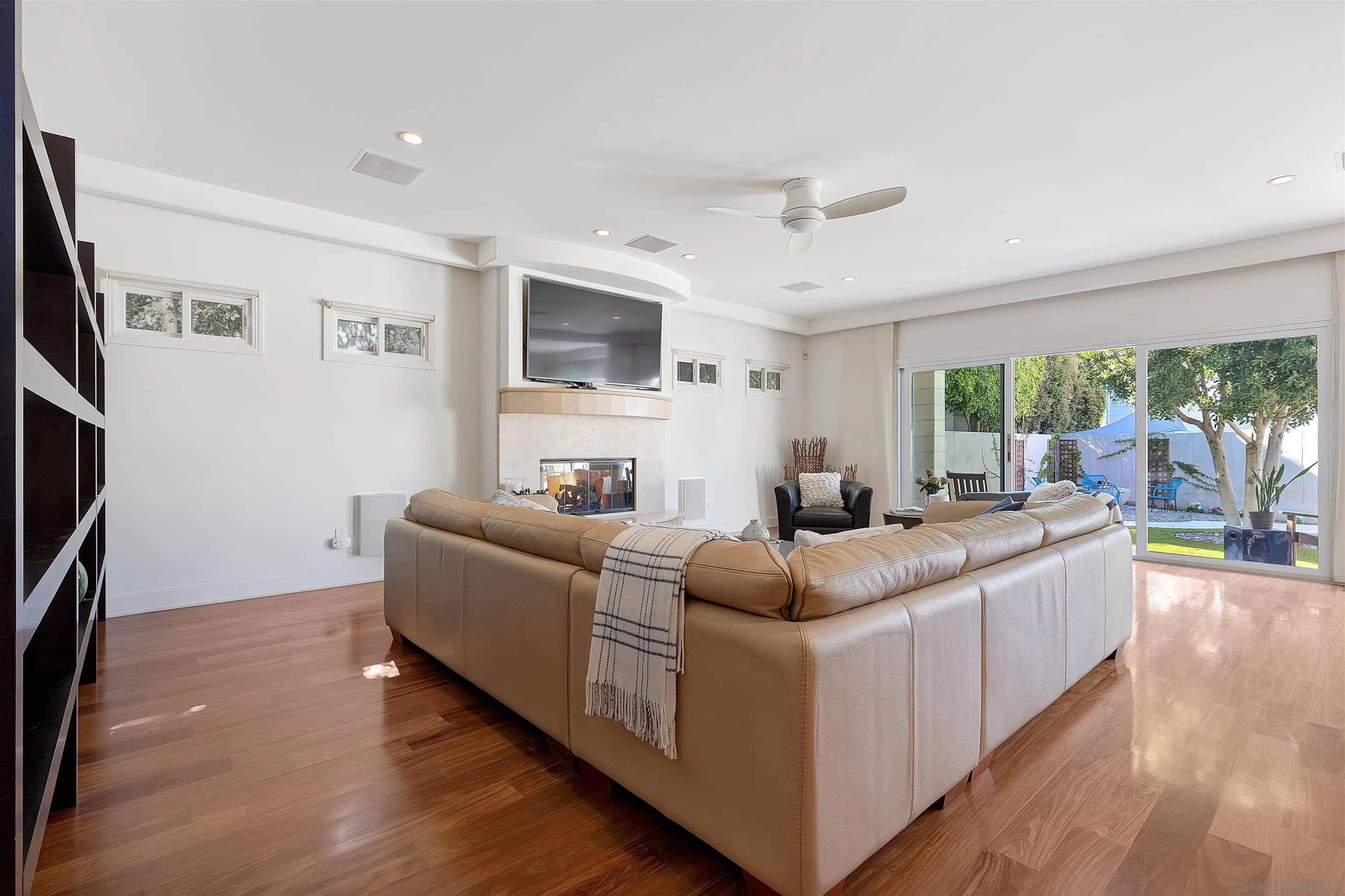 1022 G Coronado, CA 92118 - Photo 7 of 29 a living room with furniture and a flat screen tv