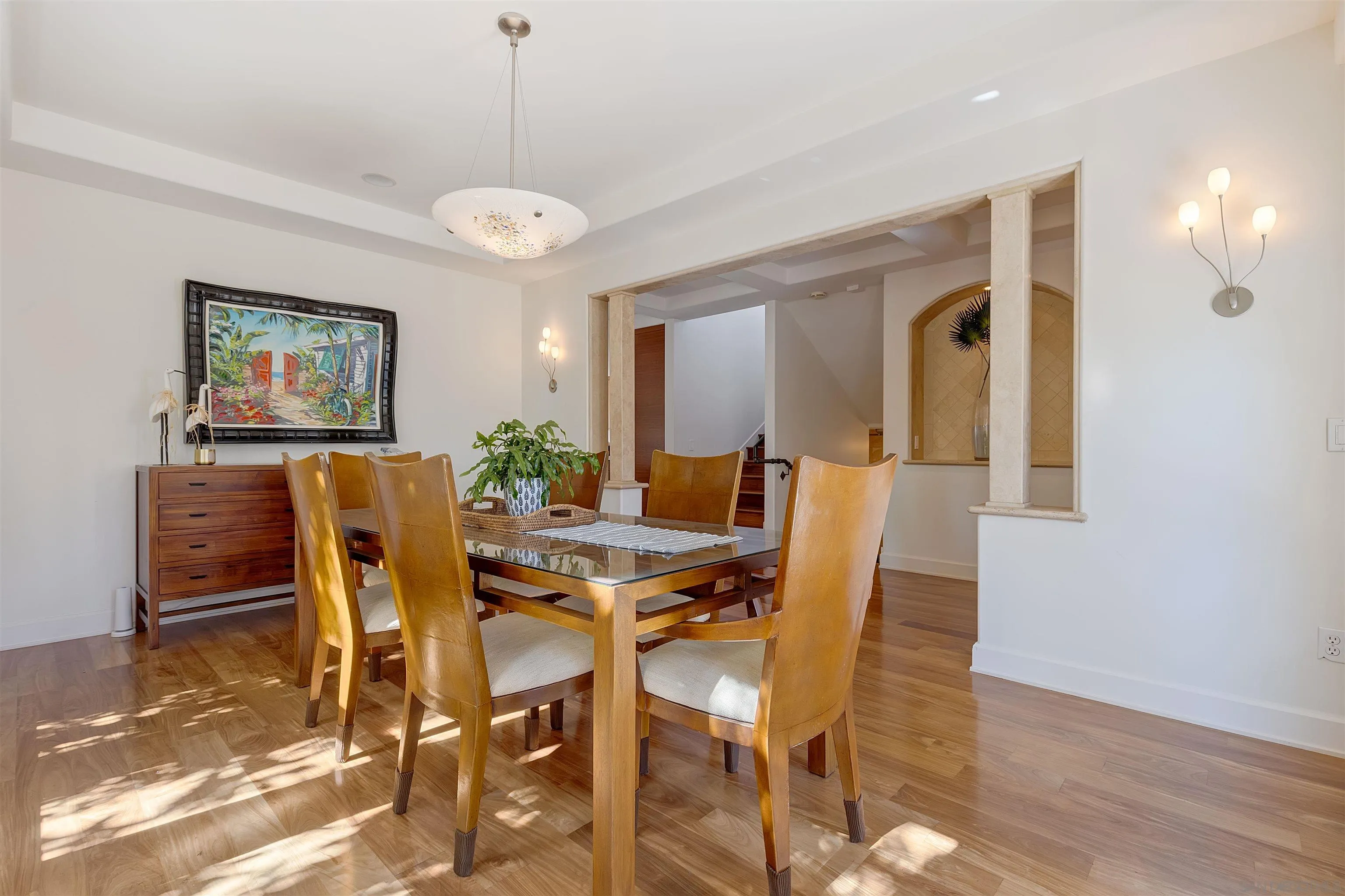 1022 G Coronado, CA 92118 - Photo 9 of 29 a view of a dining room with furniture and wooden floor