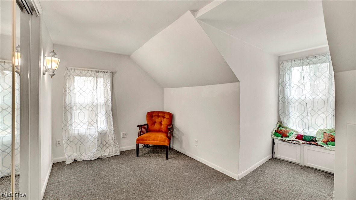 337 Pomerene Road Mansfield, OH 44906 - Photo 14 of 32 Sitting room featuring carpet flooring and vaulted ceiling