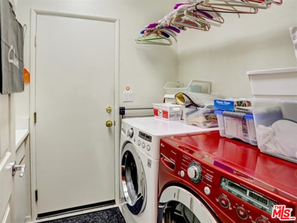 11063 Mulgrave Road San Diego, CA 92131 - Photo 19 of 30 a utility room with dryer and washer