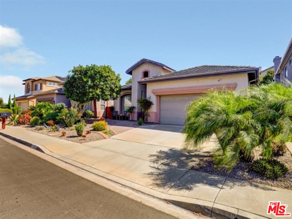 11063 Mulgrave Road San Diego, CA 92131 - Photo 3 of 30 front view of a house with potted plants