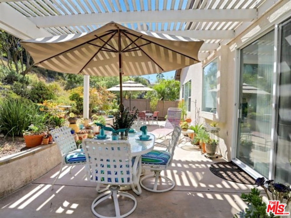 11063 Mulgrave Road San Diego, CA 92131 - Photo 29 of 30 a view of an outdoor sitting area with furniture and backyard