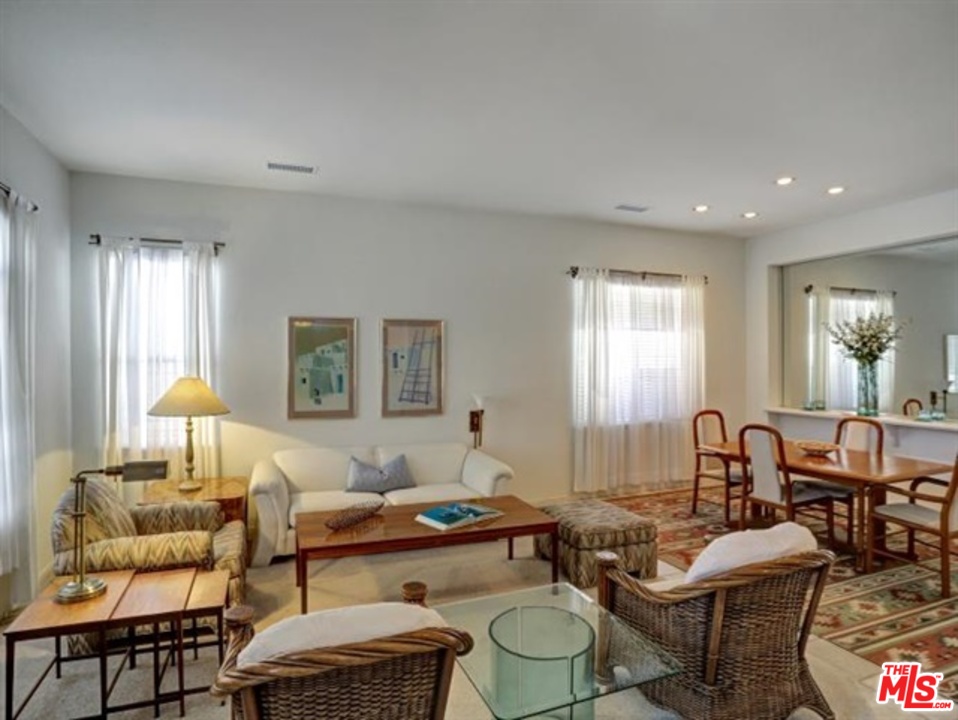 11063 Mulgrave Road San Diego, CA 92131 - Photo 5 of 30 a living room with furniture and wooden floor