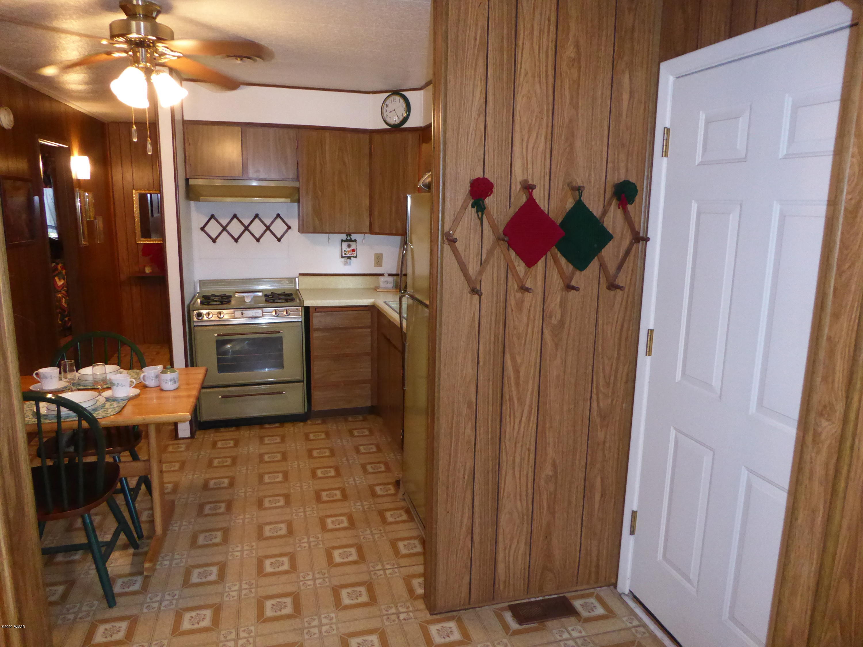 2898 Belle Road Overgaard, AZ 85933 - Photo 9 of 26 a very nice looking room with a fireplace