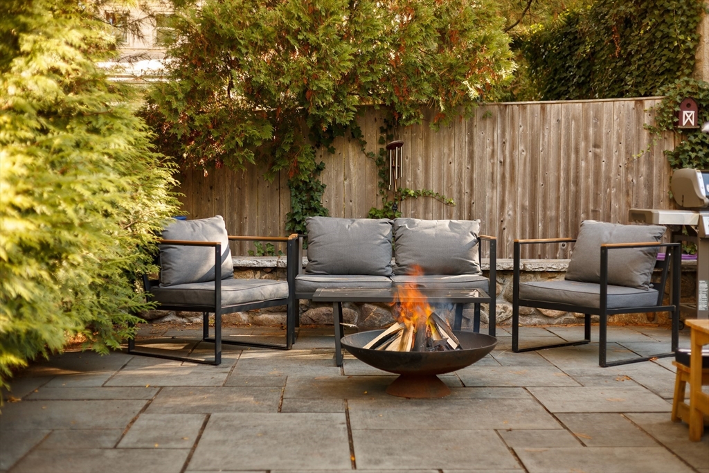 107 Grozier Road, Unit 1 Cambridge, MA 02138 - Photo 21 of 23 a view of outdoor space with seating