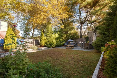 a view of a backyard of the house