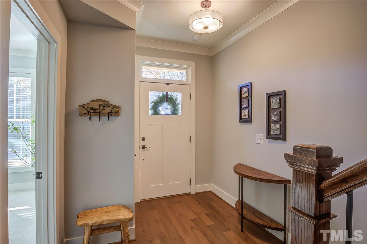 664 Watauga Street Raleigh, NC 27604 - Photo 5 of 30 a view of a workspace with furniture and a window