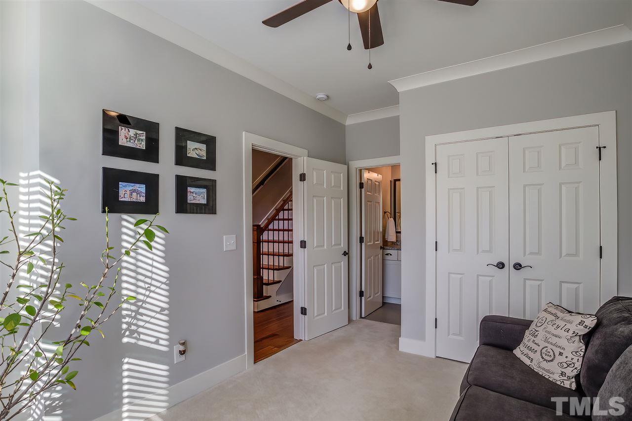 664 Watauga Street Raleigh, NC 27604 - Photo 9 of 30 a view of a livingroom with furniture and staircase