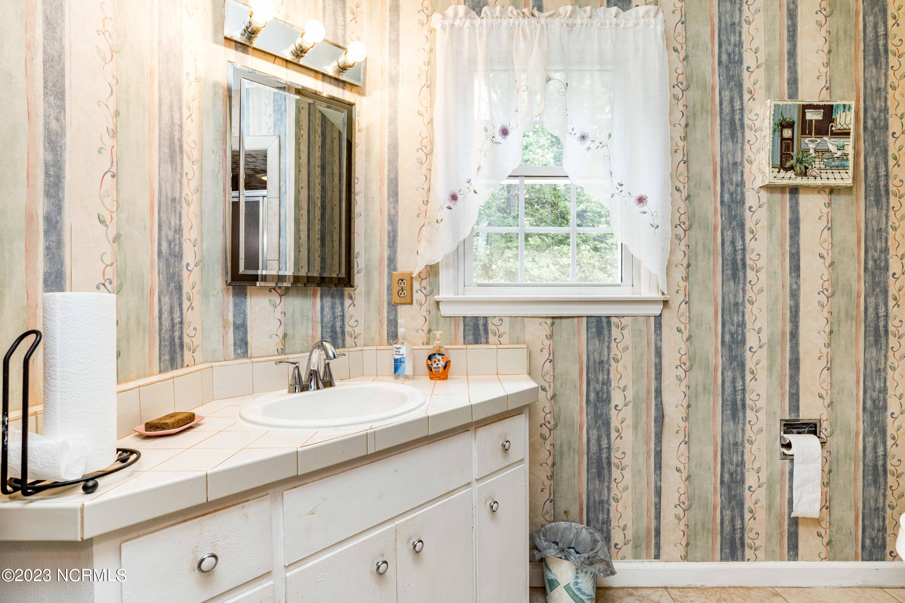 4807 Oak Park Road Raleigh, NC 27612 - Photo 18 of 32 16 Primary Bathroom
