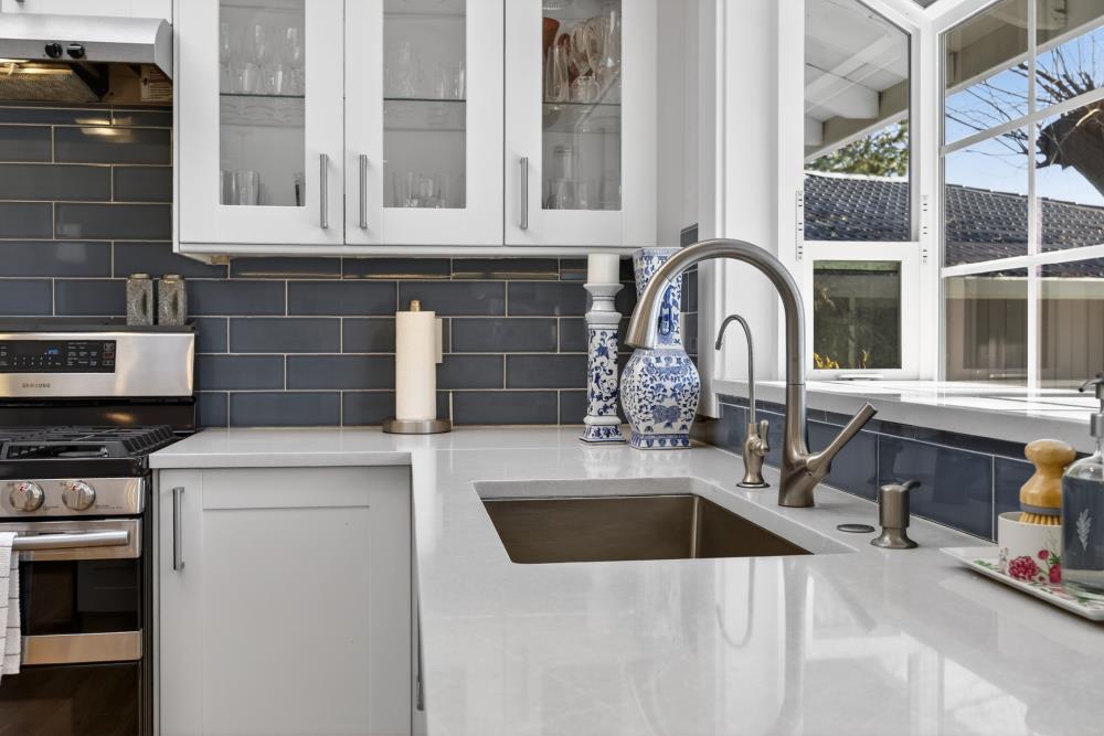 20690 County Road 79B Capay, CA 95607 - Photo 22 of 96 a kitchen with a sink and a stove top oven