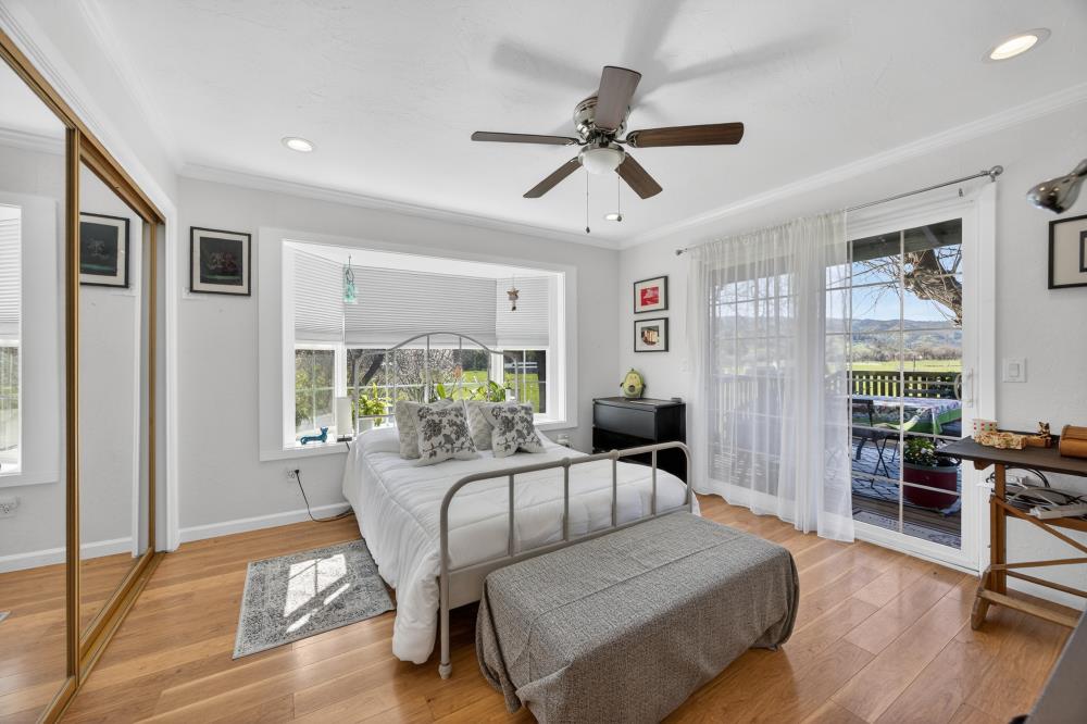 20690 County Road 79B Capay, CA 95607 - Photo 27 of 96 a living room with furniture and a large window