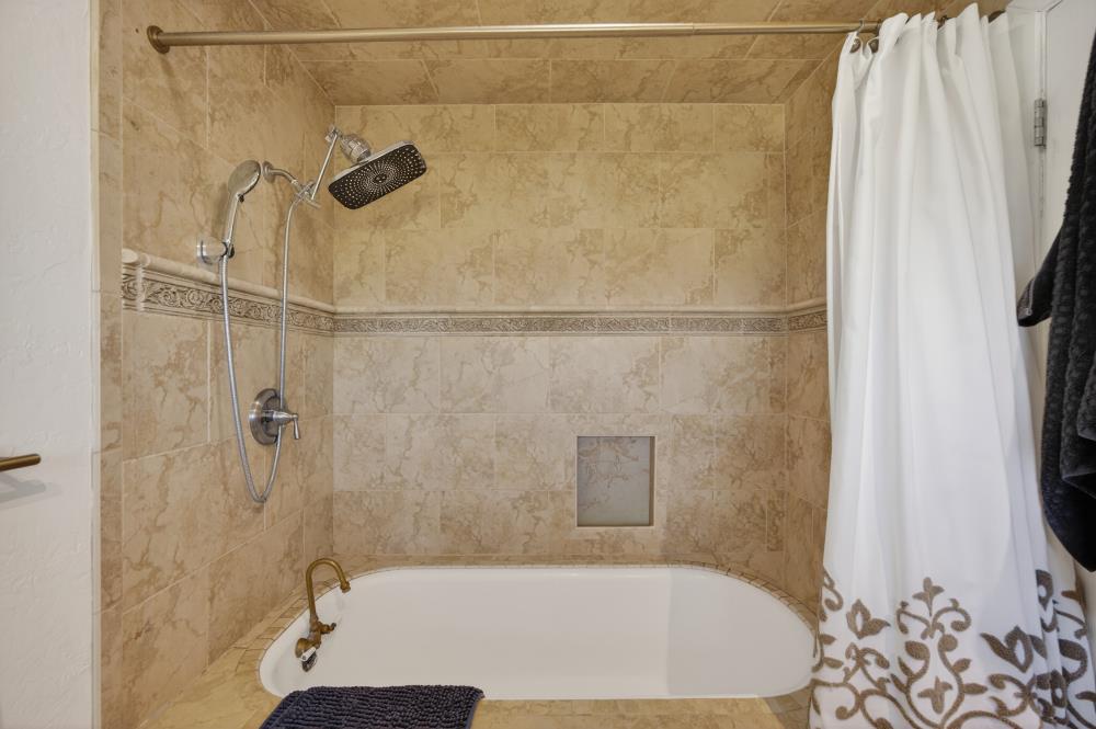 20690 County Road 79B Capay, CA 95607 - Photo 34 of 96 a bathroom with a bathtub and shower
