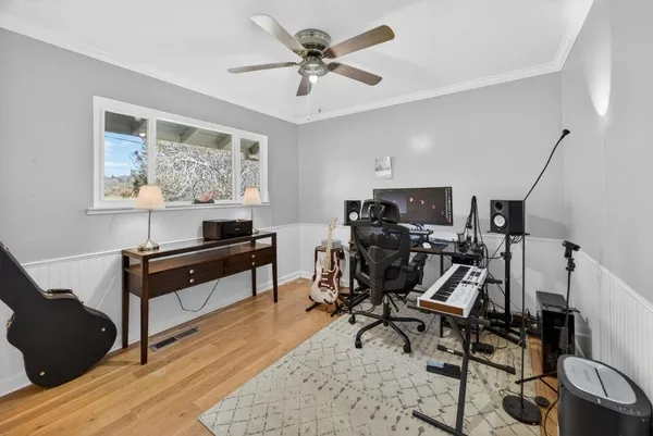 a kitchen with a sink stove and microwave