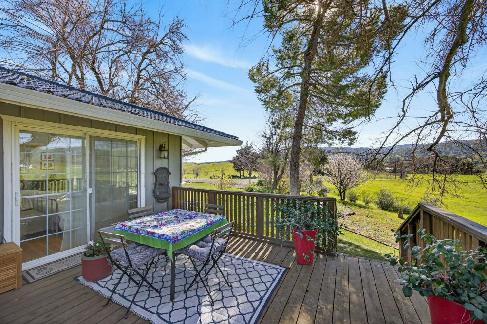 20690 County Road 79B Capay, CA 95607 - Photo 51 of 96 a view of balcony with wooden floor and outdoor seating