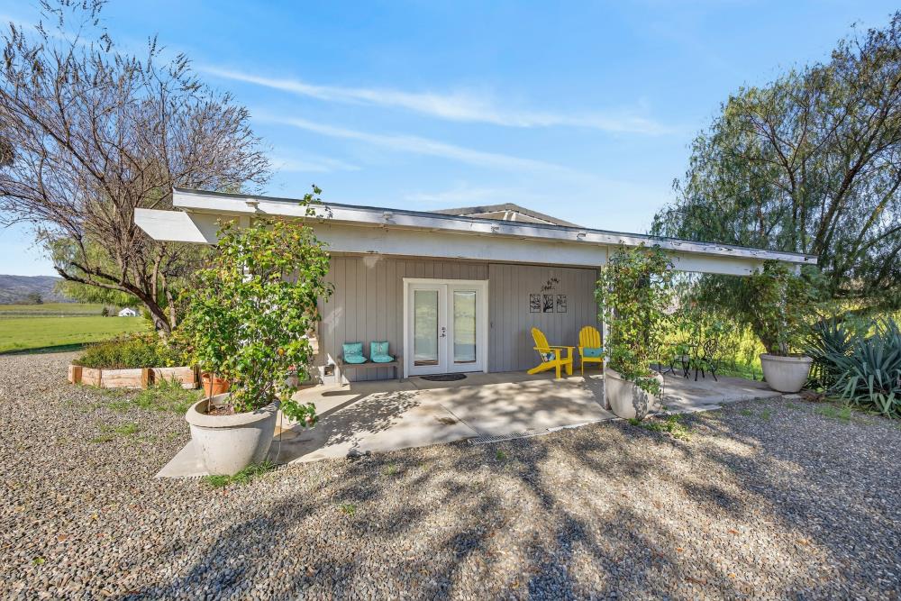 20690 County Road 79B Capay, CA 95607 - Photo 55 of 96 a view of a house with backyard and sitting area