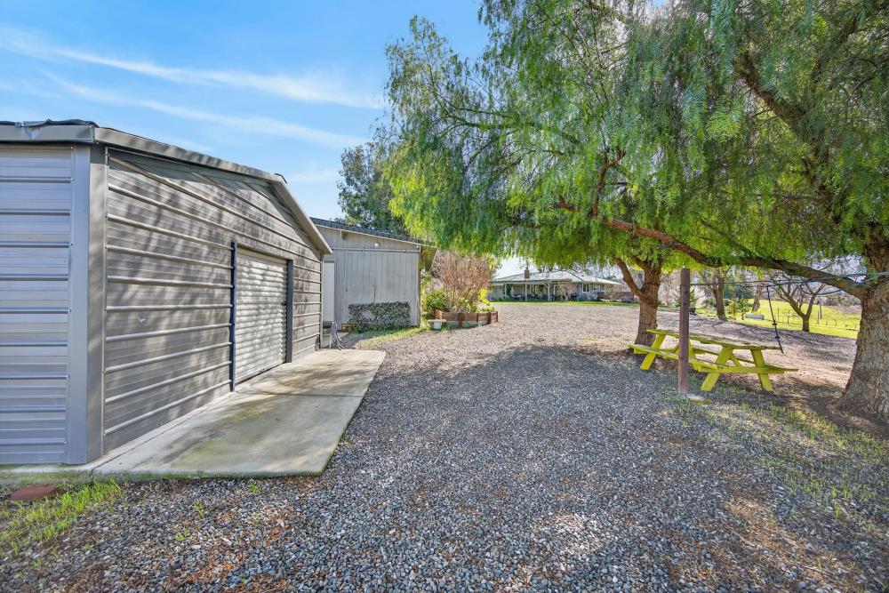 20690 County Road 79B Capay, CA 95607 - Photo 75 of 96 a view of a house with backyard and a tree