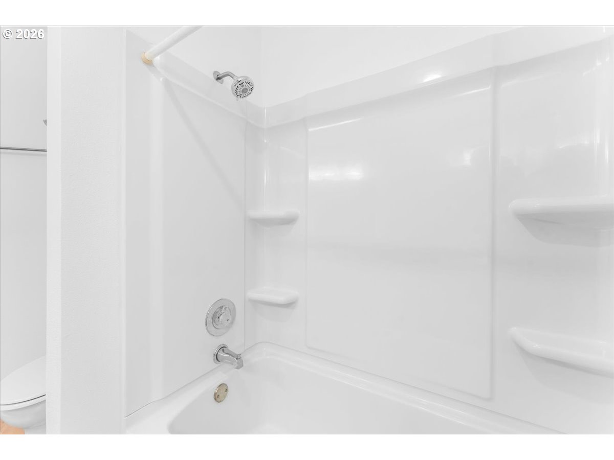 10160 Southeast Talbert Street Clackamas, OR 97015 - Photo 20 of 25 a bathroom with a shower