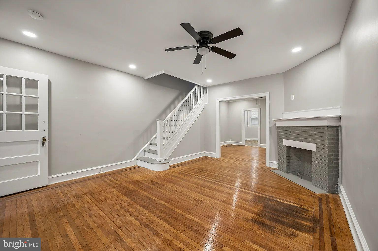5625 Willows Avenue Philadelphia, PA 19143 - Photo 3 of 15 a view of an empty room with wooden floor and a window