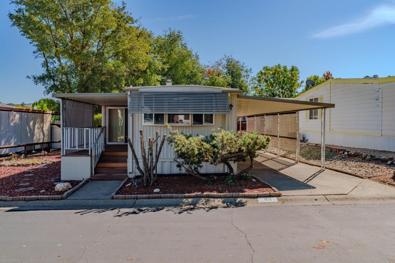 a front view of a house with porch