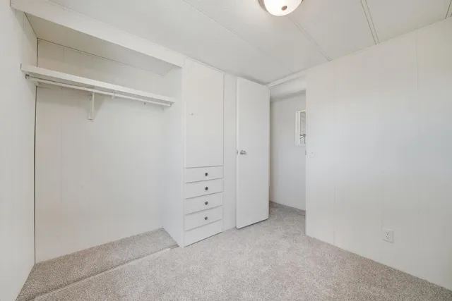 a view of livingroom with furniture and fireplace