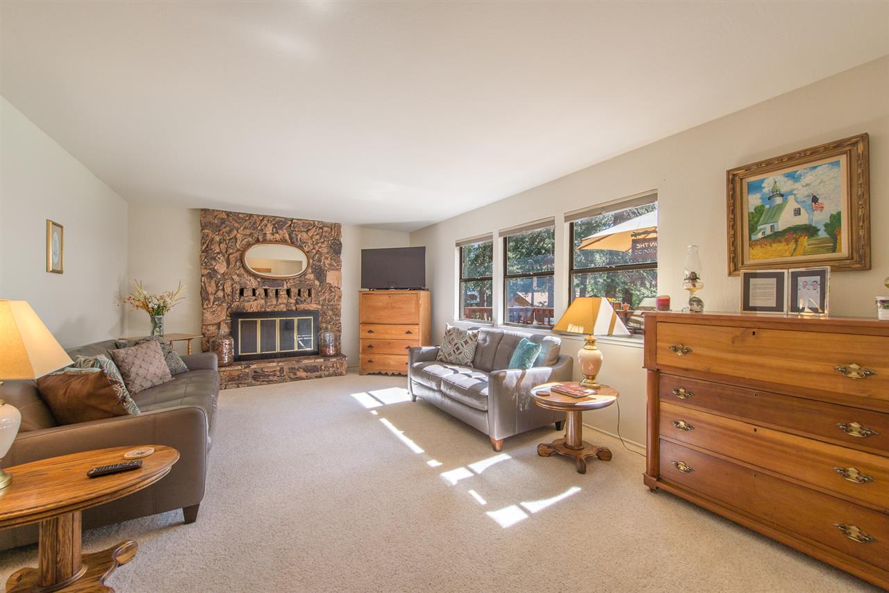 11202 Bishop Pine Road Truckee, CA 96161 - Photo 15 of 21 a living room with furniture and a large window