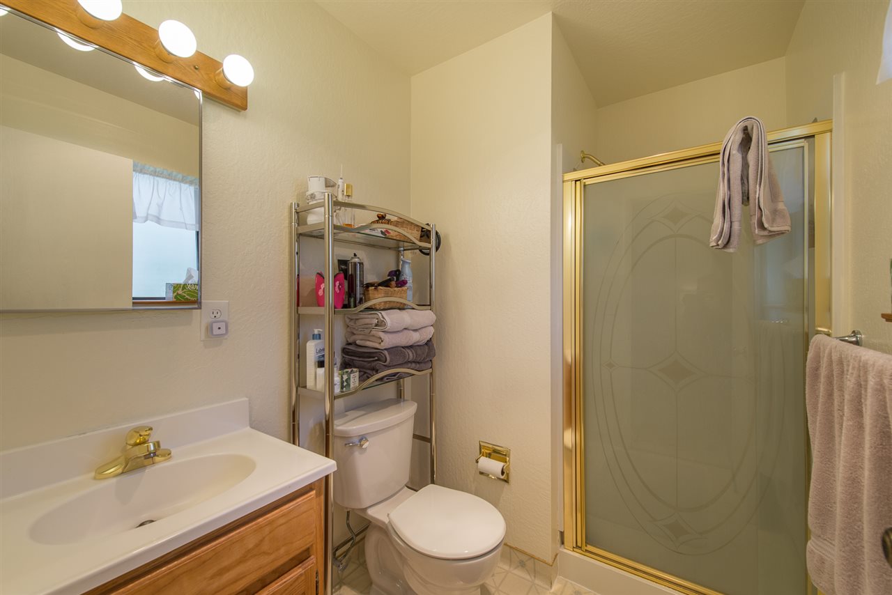 11202 Bishop Pine Road Truckee, CA 96161 - Photo 17 of 21 a bathroom with a sink vanity mirror and toilet