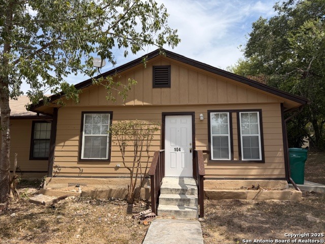 202 Ash Drive, Unit 104 Converse, TX 78109 - Photo 2 of 10 a front view of a house with large windows
