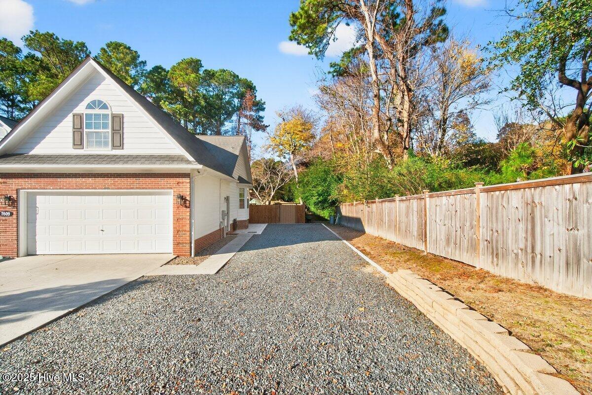 7609 Hawk Road Wilmington, NC 28411 - Photo 2 of 45 65' deep parking for fishing boat/motorhome