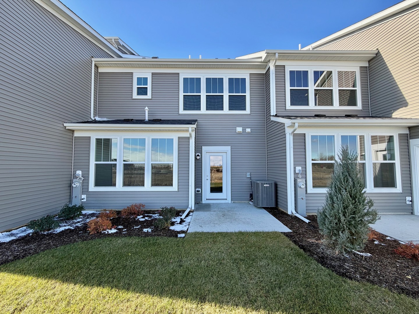 704 Switchgrass Way Bolingbrook, IL 60490 - Photo 14 of 14 a view of house with yard and garden