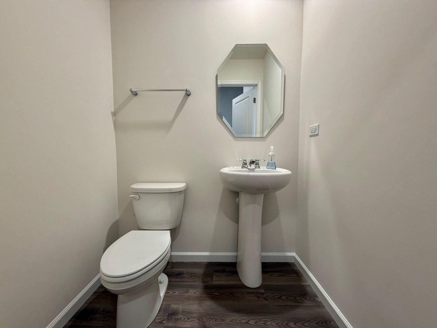 704 Switchgrass Way Bolingbrook, IL 60490 - Photo 7 of 14 a bathroom with a sink toilet and a mirror
