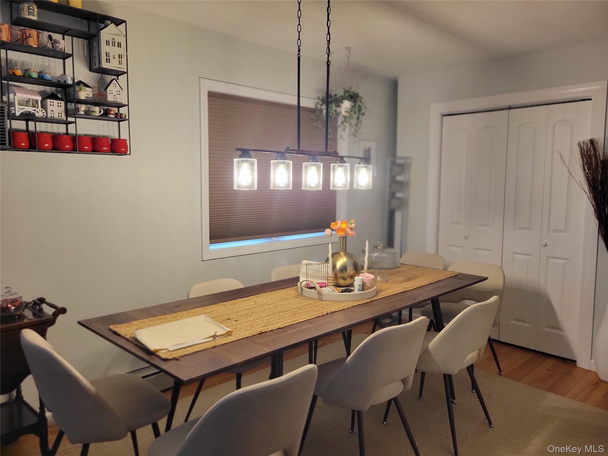 61-40 173rd Street Queens, NY 11365 - Photo 5 of 9 a view of a dining room with furniture and window