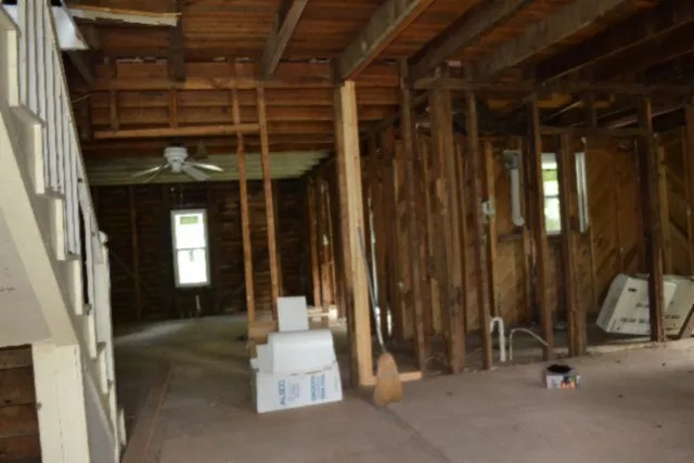 a view of a house with a small yard