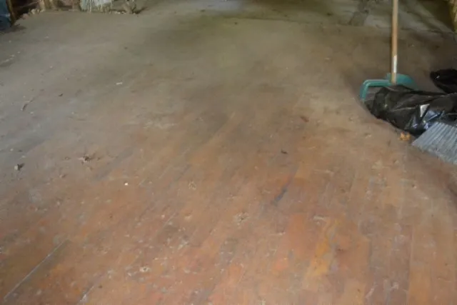 a view of walk in closet with swimming pool and windows