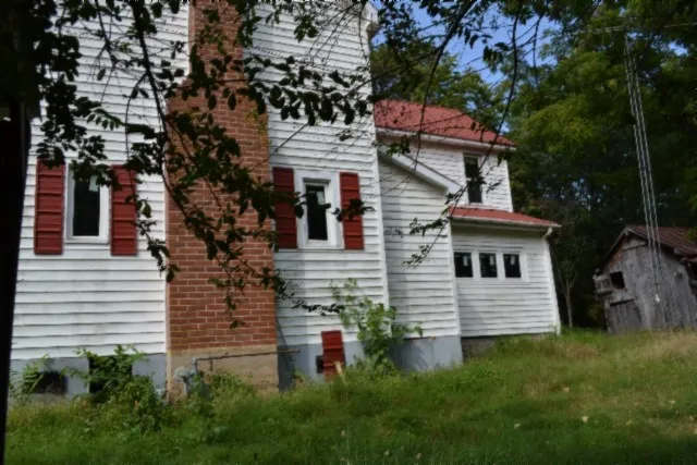 a view of a room with porch and patio
