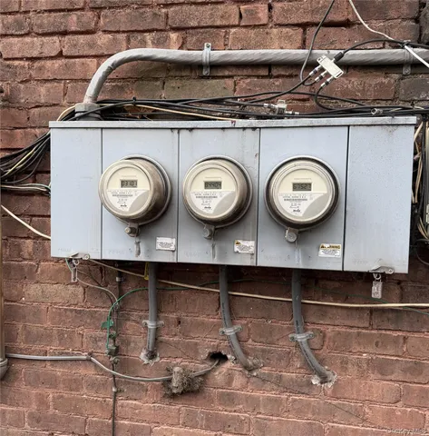 a bathroom with a stove and cabinets