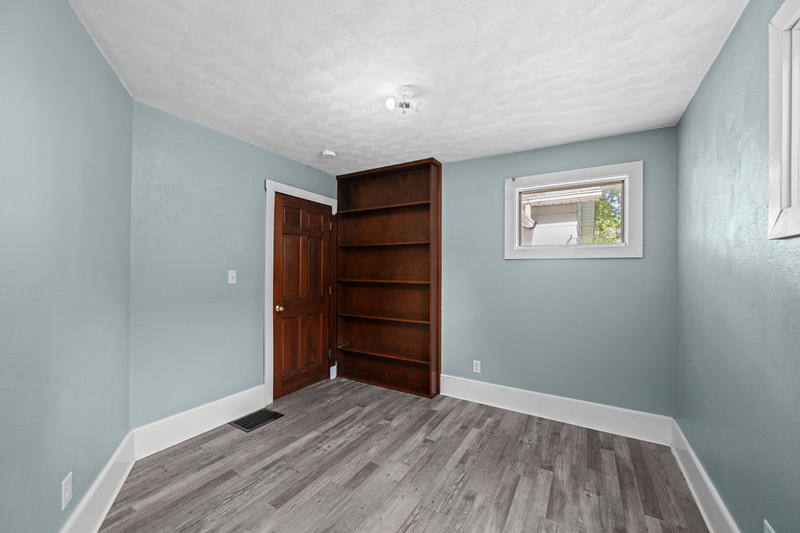 1419 17th Street Moline, IL 61265 - Photo 17 of 28 a view of an empty room with a closet