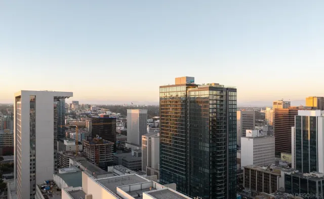 a view of city with tall buildings
