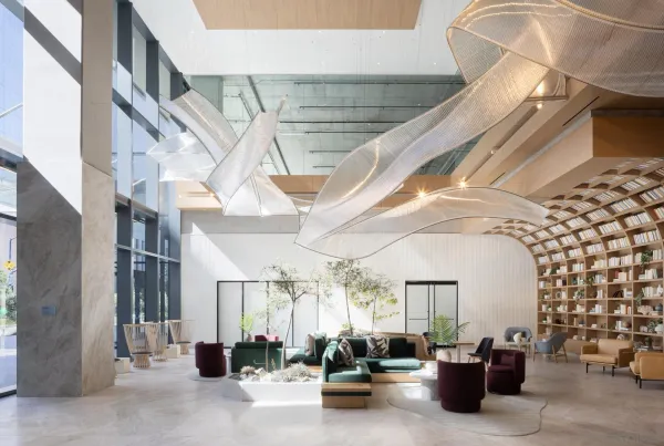 a view of a hallway with seating space